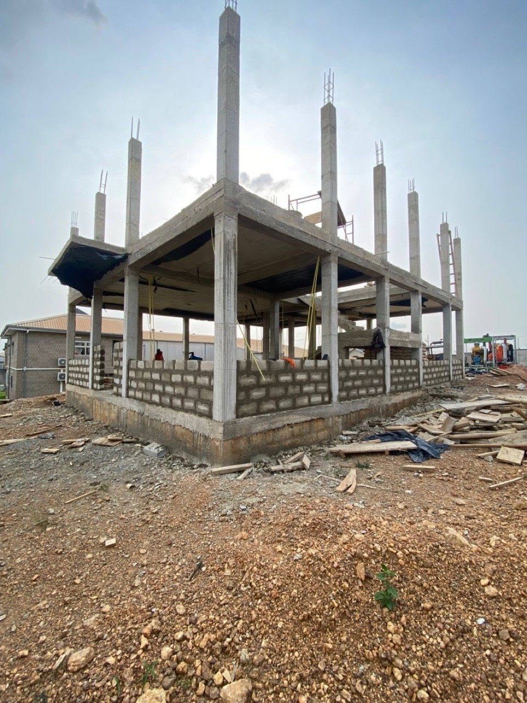 Suspended slab pour in progress on the TRI-PUMP Ghana office complex in Obuasi